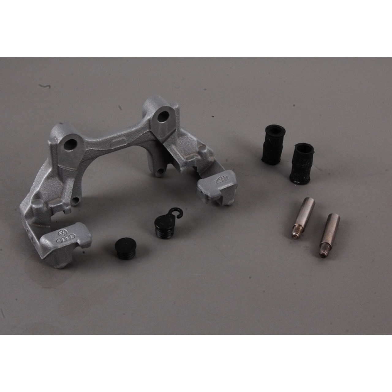 Original Bremssattelhalter VW